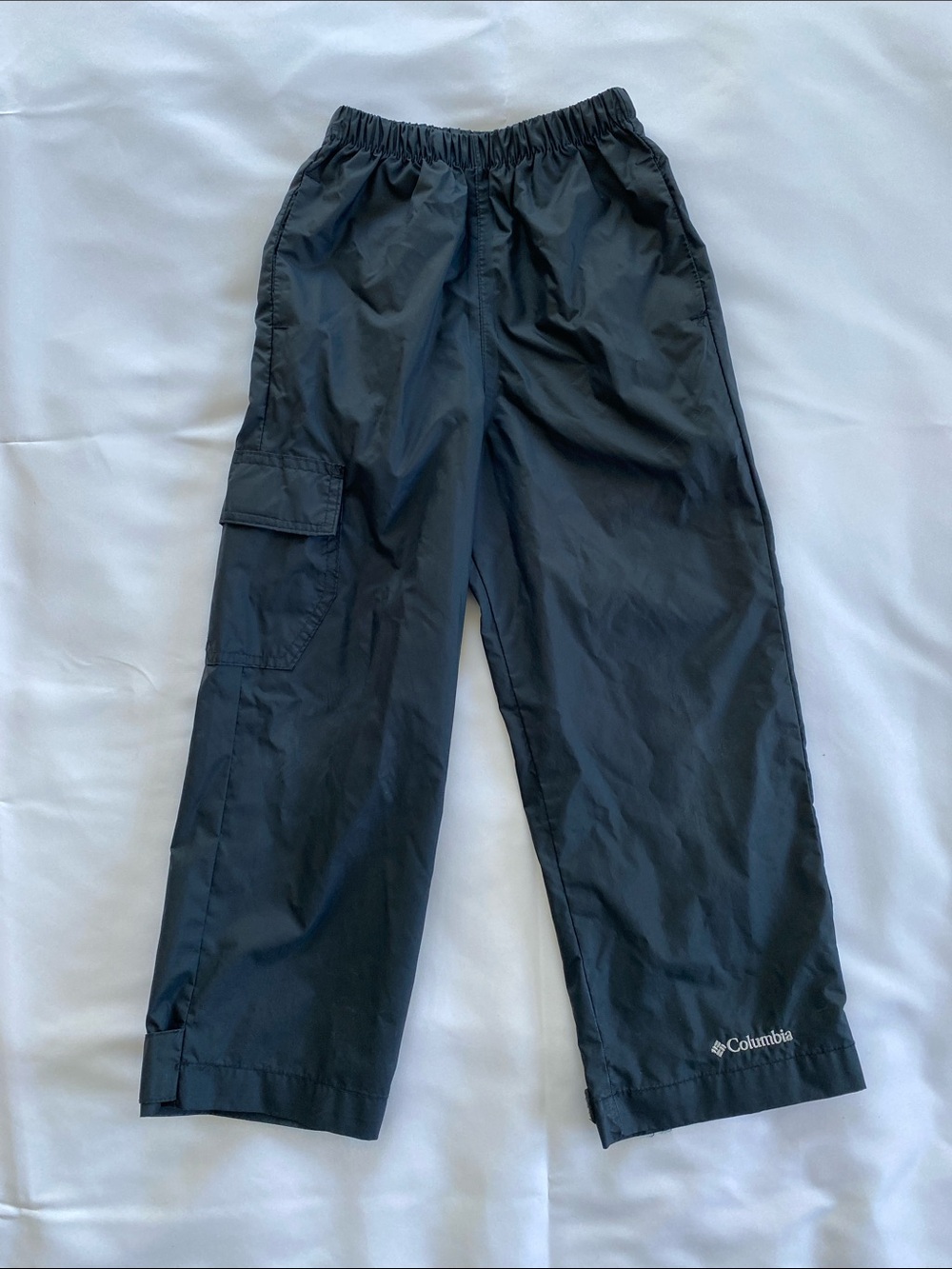 Columbia Black Kids Rain Pants with elastic waistband and adjustable leg cuffs